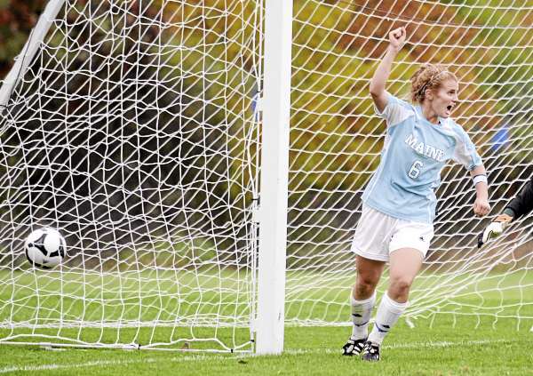 The University of Maine's Kaitlyn MacIsaac celebrates her teammate Maggie Malone's goal against Vermont during the first half of the game in Orono Thursday. Maine won the game 2-1. (Bangor Daily News/Gabor Degre) The University of Maine's Kaitlyn MacIsaac celebrates her teammate Maggie Malone's goal against Vermont during the first half of the game in Orono Thursday. Maine won the game 2-1. (Bangor Daily News/Gabor Degre)