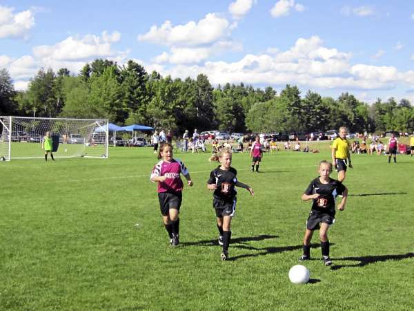 Jordan Foley (left) of the Saco Soccer Club, Ellie Horr of Brewer (middle) and Kelsi Day of Brewer (right) chase down the ball during a U11 girls soccer game at the Just for Fun youth tournament at Twin Brook Recreation Center in Cumberland Saturday afternoon. Jordan Foley (left) of the Saco Soccer Club, Ellie Horr of Brewer (middle) and Kelsi Day of Brewer (right) chase down the ball during a U11 girls soccer game at the Just for Fun youth tournament at Twin Brook Recreation Center in Cumberland Saturday afternoon.