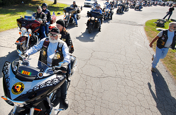 Wayne Lavoie and his wife Terri Crosby of Lucerne, Maine and other members of the Combat Veterans Motorcycle Association get ready to leave their rally point at the Days Inn in Bangor for their procession downtown and their 9/11 wreath laying ceremony at the Cole Family Land Transportation Museum in Bangor Saturday morning. BANGOR DAILY NEWS PHOTO BY JOHN CLARKE RUSS Wayne Lavoie and his wife Terri Crosby of Lucerne, Maine and other members of the Combat Veterans Motorcycle Association get ready to leave their rally point at the Days Inn in Bangor for their procession downtown and their 9/11 wreath laying ceremony at the Cole Family Land Transportation Museum in Bangor Saturday morning. BANGOR DAILY NEWS PHOTO BY JOHN CLARKE RUSS