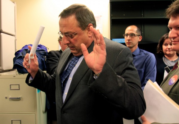 Republican gubernatorial candidate Paul LePage exits a news conference where he outlined his job-creation plan, in Augusta, Maine, on Monday, Sept. 13, 2010. LePage deflected questions about taxes paid on a Florida home. He replied testily that questions about tax exemptions claimed by his wife already have been answered. The Kennebec Journal reported last week that Ann LePage claimed permanent residency in both states and could be fined in Florida. LePage's campaign described it as a "paperwork error." (AP Photo/Pat Wellenbach) Republican gubernatorial candidate Paul LePage exits a news conference where he outlined his job-creation plan, in Augusta, Maine, on Monday, Sept. 13, 2010. LePage deflected questions about taxes paid on a Florida home. He replied testily that questions about tax exemptions claimed by his wife already have been answered. The Kennebec Journal reported last week that Ann LePage claimed permanent residency in both states and could be fined in Florida. LePage's campaign described it as a "paperwork error." (AP Photo/Pat Wellenbach)