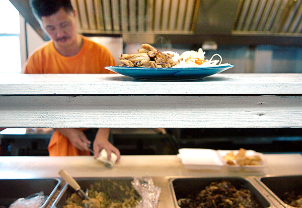 (BANGOR DAILY NEWS PHOTO BY BRIDGET BROWN)
CAPTION
A hot plate of freshly made Hawiian BBQ chicken, served with a scoop of rice and a scoop of macaroni salad, awaits transport from the kitchen of WowWee Hawaiian BBQ on Friday, Sept. 10, 2010 in Brewer. Head cook and co-owner Ken Wong is pictured at left. (Bangor Daily News/Bridget Brown) (BANGOR DAILY NEWS PHOTO BY BRIDGET BROWN)
CAPTION
A hot plate of freshly made Hawiian BBQ chicken, served with a scoop of rice and a scoop of macaroni salad, awaits transport from the kitchen of WowWee Hawaiian BBQ on Friday, Sept. 10, 2010 in Brewer. Head cook and co-owner Ken Wong is pictured at left. (Bangor Daily News/Bridget Brown)