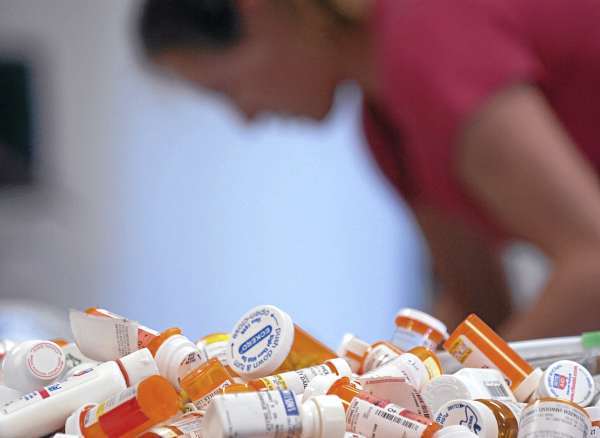 (BANGOR DAILY NEWS PHOTO BY BRIDGET BROWN)
CAPTION
Amanda Chamberlain (background) sorts through medicines Tuesday, Sept. 14, 2010, as part of the Safe Medicine Disposal for ME program, which provides Maine residents with a safe disposal option for unused and unwanted medicine. (Bangor Daily News/Bridget Brown) (BANGOR DAILY NEWS PHOTO BY BRIDGET BROWN)
CAPTION
Amanda Chamberlain (background) sorts through medicines Tuesday, Sept. 14, 2010, as part of the Safe Medicine Disposal for ME program, which provides Maine residents with a safe disposal option for unused and unwanted medicine. (Bangor Daily News/Bridget Brown)