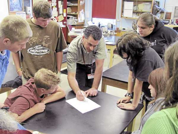 W/ Cousinis' story "usdatalk". A group of taxidermy students at Nokomis Regional High School on Sept. 15, 2010 and Adam Vashon, a biologist with the USDA's Wildlife Services Program, prioritize a list of preserved bird skins he needs for training airport personnel how to keep birds away from aircraft.(Bangor Daily News/Christopher Cousins) W/ Cousinis' story "usdatalk". A group of taxidermy students at Nokomis Regional High School on Sept. 15, 2010 and Adam Vashon, a biologist with the USDA's Wildlife Services Program, prioritize a list of preserved bird skins he needs for training airport personnel how to keep birds away from aircraft.(Bangor Daily News/Christopher Cousins)