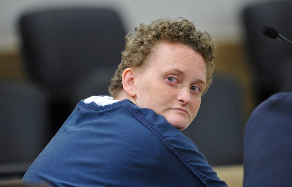 Laura Smith looks towards the gallery during the judge's recess in her sentencing Friday morning, September 24, 2010. She had pleaded guilty to scalding a man with hot water and sexuallly assaulting him with a broom handle. Smith was sentenced to 6 years in prison. (Bangor Daily News/John Clarke Russ) Laura Smith looks towards the gallery during the judge's recess in her sentencing Friday morning, September 24, 2010. She had pleaded guilty to scalding a man with hot water and sexuallly assaulting him with a broom handle. Smith was sentenced to 6 years in prison. (Bangor Daily News/John Clarke Russ)