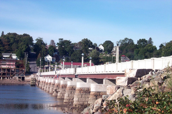 A restored version of the old bridge that carried U.S. Route 1 travelers across the Passaagassawaukeag River in Belfast for 40 years (1921) photo, above) has been restored, and its role as a footbridge will be celebrated this weekend. A day of events will be capped by fireworks Saturday night. (Bangor Daily News photo by Walter Griffin) A restored version of the old bridge that carried U.S. Route 1 travelers across the Passaagassawaukeag River in Belfast for 40 years (1921) photo, above) has been restored, and its role as a footbridge will be celebrated this weekend. A day of events will be capped by fireworks Saturday night. (Bangor Daily News photo by Walter Griffin)
