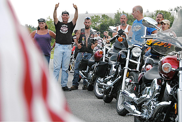 CYRRIDE3: About 50 members of the Donald V. Henry American Legion Post 80 of Millinocket Riders club and their guests meet at the legion hall off Route 11 in Millinocket on July 17. That ride raised about $650 for the Adopt A Soldier program. Club members Rick Cyr Jr. and Jessica Pelkey are organizing the club's third ride for a charity on Sunday. (Bangor Daily News/Nick Sambides Jr.) CYRRIDE3: About 50 members of the Donald V. Henry American Legion Post 80 of Millinocket Riders club and their guests meet at the legion hall off Route 11 in Millinocket on July 17. That ride raised about $650 for the Adopt A Soldier program. Club members Rick Cyr Jr. and Jessica Pelkey are organizing the club's third ride for a charity on Sunday. (Bangor Daily News/Nick Sambides Jr.)