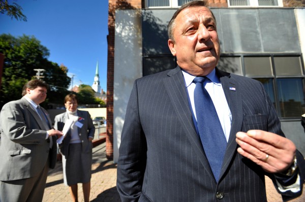 Standing in front of Willey Law Offices on Columbia Street, Republican gubernatorial candidate Paul LePage fields questions from the media while making campaign stops in Bangor Tuesday, Oct. 5, 2010. Behind him are his deputy chief of staff John McGough (cq) and campaign supporter Cathy Watson of Pittsfield. (Bangor Daily News/John Clarke Russ) Standing in front of Willey Law Offices on Columbia Street, Republican gubernatorial candidate Paul LePage fields questions from the media while making campaign stops in Bangor Tuesday, Oct. 5, 2010. Behind him are his deputy chief of staff John McGough (cq) and campaign supporter Cathy Watson of Pittsfield. (Bangor Daily News/John Clarke Russ)