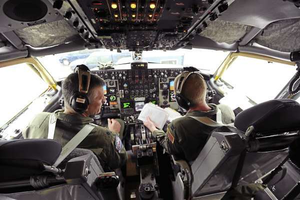 Lt. Col. Brent Stewart, left, of Brewer and Capt. Jason Tuck of Hampden do a pre-flight check list as they prepare to fly a KC-135 E on a training mission out of the Maine Air National Guard base in Bangor on Wednesday, October 6, 2010. (Bangor Daily News/Kevin Bennett) Lt. Col. Brent Stewart, left, of Brewer and Capt. Jason Tuck of Hampden do a pre-flight check list as they prepare to fly a KC-135 E on a training mission out of the Maine Air National Guard base in Bangor on Wednesday, October 6, 2010. (Bangor Daily News/Kevin Bennett)