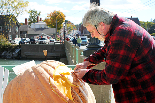 Tom Block, an art teacher at Wiscasset High School, volunteered to carve an owl out of a pumpkin Saturday at the Damariscotta Pumpkinfest. BANGOR DAILY NEWS PHOTO BY HEATHER STEEVES Tom Block, an art teacher at Wiscasset High School, volunteered to carve an owl out of a pumpkin Saturday at the Damariscotta Pumpkinfest. BANGOR DAILY NEWS PHOTO BY HEATHER STEEVES