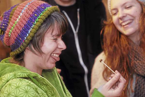 College of the Atlantic second year student Ivy Sienkiewycz, left, of Starksboro, VT initially showed her reluctance to sampling a cricket sauteed in garlic and butter as classmate Gabriela Niejadlik, right of Wantage, N.J. and other friends shared in the fun at Halloween themed bug eating event the college's Dorr Museum of Natural History Saturday evening. "I didn't notice the bug taste so much," said Sienkiewycz. (Bangor Daily News/John Clarke Russ) College of the Atlantic second year student Ivy Sienkiewycz, left, of Starksboro, VT initially showed her reluctance to sampling a cricket sauteed in garlic and butter as classmate Gabriela Niejadlik, right of Wantage, N.J. and other friends shared in the fun at Halloween themed bug eating event the college's Dorr Museum of Natural History Saturday evening. "I didn't notice the bug taste so much," said Sienkiewycz. (Bangor Daily News/John Clarke Russ)