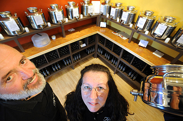 Pat O'Brien (left) and his wife Nancy O'Brien own the Fiore Olive Oil stores in Bar Harbor and Rockland. The sell 17 varieties of extra virgin olive oil and 16 different balsamic vinegars that ar all imported products. On the right is a fusti, an Italian made oil or vinegar vessel. (Bangor Daily News/Gabor Degre) Pat O'Brien (left) and his wife Nancy O'Brien own the Fiore Olive Oil stores in Bar Harbor and Rockland. The sell 17 varieties of extra virgin olive oil and 16 different balsamic vinegars that ar all imported products. On the right is a fusti, an Italian made oil or vinegar vessel. (Bangor Daily News/Gabor Degre)