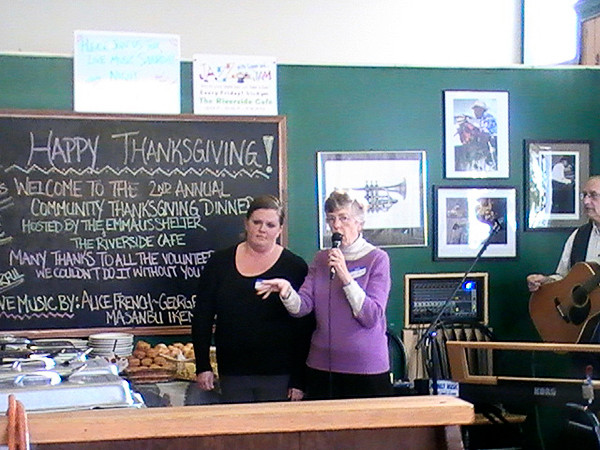 Sister Lucille MacDonald (right), director of the Emmaus Center in Ellsworth, and Danielle Chatto, dining room manager for the Riverside Cafe, welcome community members to the second annual Thanksgiving dinner on Thursday afternoon. BANGOR DAILY NEWS PHOTO BY ERIC RUSSELL 3 col max Sister Lucille MacDonald (right), director of the Emmaus Center in Ellsworth, and Danielle Chatto, dining room manager for the Riverside Cafe, welcome community members to the second annual Thanksgiving dinner on Thursday afternoon. BANGOR DAILY NEWS PHOTO BY ERIC RUSSELL 3 col max