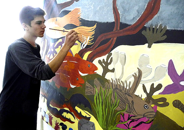 Local artists have stepped forward to make sure that Eastport students get an education in art since, due to budget constraints, all art programs were cut from Eastport schools several years ago. Cecil Cates, 17, is a senior at Shead High School and is applying to art schools for his further education. On Monday, Nov. 29, 2010, Cates, along with Rosa Bragdon, 16, of Eastport, and Deserae Apt, 15, of Perry, are putting the final touches on a large mural with the help of local artist and bronzist Richard Klyver, at the Eastport Arts Center. "This is a collaborative thing for me but it's a whole world of discovery for them," Klyver said. BANGOR DAILY NEWS PHOTO BY SHARON KILEY MACK Local artists have stepped forward to make sure that Eastport students get an education in art since, due to budget constraints, all art programs were cut from Eastport schools several years ago. Cecil Cates, 17, is a senior at Shead High School and is applying to art schools for his further education. On Monday, Nov. 29, 2010, Cates, along with Rosa Bragdon, 16, of Eastport, and Deserae Apt, 15, of Perry, are putting the final touches on a large mural with the help of local artist and bronzist Richard Klyver, at the Eastport Arts Center. "This is a collaborative thing for me but it's a whole world of discovery for them," Klyver said. BANGOR DAILY NEWS PHOTO BY SHARON KILEY MACK