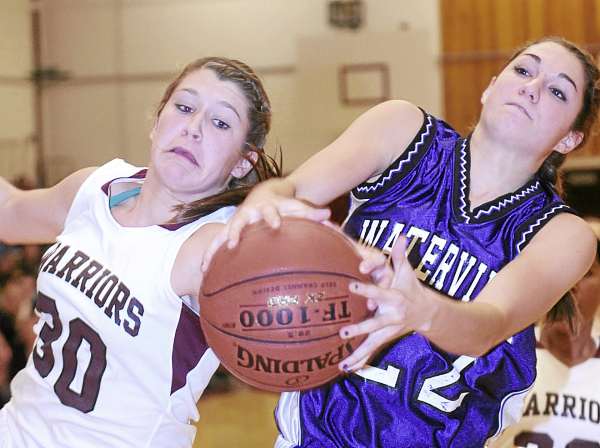 Nokomis' Anna Mackenzie (left) Waterville's Emily Karter battle for the ball during the first half of their game in Newport Friday night. Nokomis won 50-19. (Bangor Daily News Photo By Gabor Degre) Nokomis' Anna Mackenzie (left) Waterville's Emily Karter battle for the ball during the first half of their game in Newport Friday night. Nokomis won 50-19. (Bangor Daily News Photo By Gabor Degre)