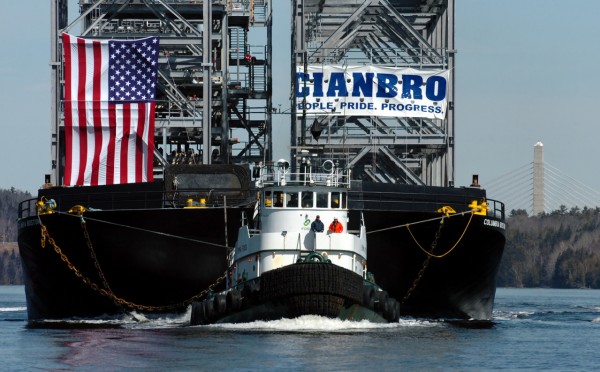 CAPTION
The Columbia Boston barge loaded with six steel modules and accompanied by the Emma Foss (foreground), moves towards Searsport on the Penobscot River on Thursday, March 26, 2009. The modules are the first of 53 made by Cianbro Corp. for Motiva Enterprises LLC and which will make the 2500 mile journey to Port Arthur, Texas to be used for an oil refinery expansion. BANGOR DAILY NEWS PHOTO BY BRIDGET BROWN (WEB EDITION PHOTO) CAPTION
The Columbia Boston barge loaded with six steel modules and accompanied by the Emma Foss (foreground), moves towards Searsport on the Penobscot River on Thursday, March 26, 2009. The modules are the first of 53 made by Cianbro Corp. for Motiva Enterprises LLC and which will make the 2500 mile journey to Port Arthur, Texas to be used for an oil refinery expansion. BANGOR DAILY NEWS PHOTO BY BRIDGET BROWN (WEB EDITION PHOTO)