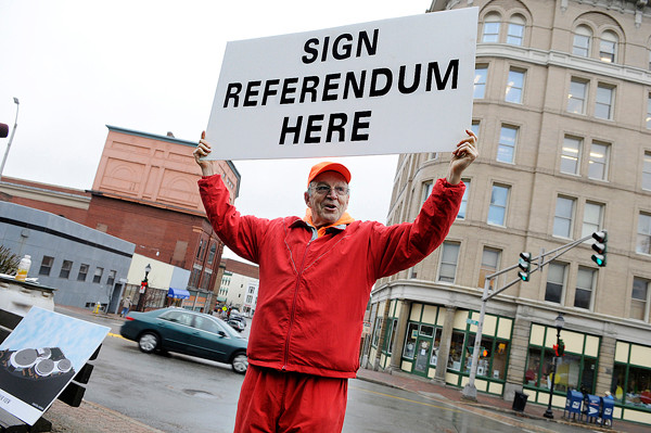 Bob Cimbollek voices his concerns during Monday afternoon's press conference in front of Bangor City Hall. Cimbollek and other concerned Bangor residents recently launched a petition drive regarding a referendum on the arena. They have until mid-January to gather 2236 signatures. (Bangor Daily News/John Clarke Russ) Bob Cimbollek voices his concerns during Monday afternoon's press conference in front of Bangor City Hall. Cimbollek and other concerned Bangor residents recently launched a petition drive regarding a referendum on the arena. They have until mid-January to gather 2236 signatures. (Bangor Daily News/John Clarke Russ)