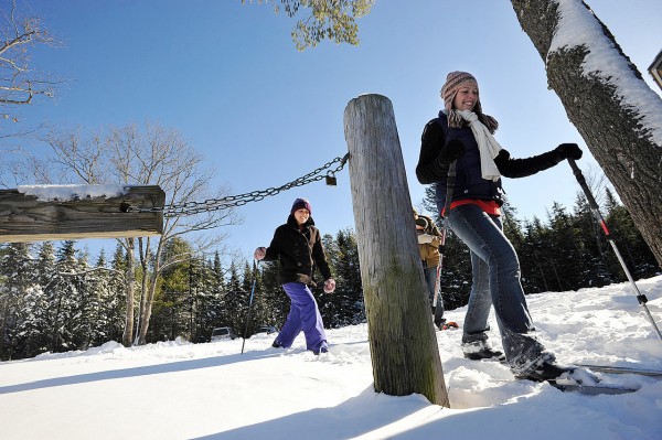 Hannah Richards of Bangor and Sarah Carter of Old Town lead Jonathan Holland and infant son Austen (both partially obscured) and Carter's fiance Robby Lambert (cq) (not pictured) of Old Town for a trek over the fresh snow at the Rolland F. Perry City Forest Tuesday. (Bangor Daily News/John Clarke Russ) Hannah Richards of Bangor and Sarah Carter of Old Town lead Jonathan Holland and infant son Austen (both partially obscured) and Carter's fiance Robby Lambert (cq) (not pictured) of Old Town for a trek over the fresh snow at the Rolland F. Perry City Forest Tuesday. (Bangor Daily News/John Clarke Russ)