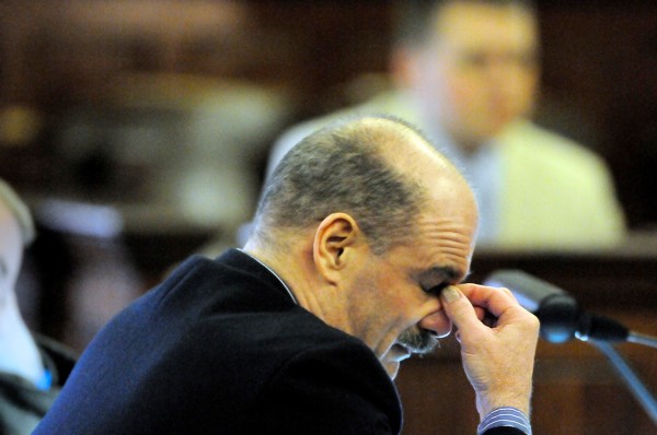 Randall Hofland of Searsport rubs his eyes as Justice Jeffrey Hjelm reads the dozens charges pending against him before opening arguments in his trial at Waldo County Superior Curt Friday afternoon, Jan. 7, 2011. He is accused of taking a fifth grade classroom hostage on Oct. 31, 2011. He is also charged with pointing a gun at an officer at a routine traffic stop earlier that month. Hofland opted to deliver his opening arguments later in the trial. (Bangor Daily News/John Clarke Russ) Randall Hofland of Searsport rubs his eyes as Justice Jeffrey Hjelm reads the dozens charges pending against him before opening arguments in his trial at Waldo County Superior Curt Friday afternoon, Jan. 7, 2011. He is accused of taking a fifth grade classroom hostage on Oct. 31, 2011. He is also charged with pointing a gun at an officer at a routine traffic stop earlier that month. Hofland opted to deliver his opening arguments later in the trial. (Bangor Daily News/John Clarke Russ)
