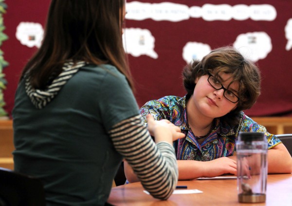 Kalie Hess, left, a University of Maine student, plays a board game with her mentoree, Old Town Elementary School student Abby Montieth, right, on Wednesday, January 19, 2011. Old Town Elementary School's mentoring program is aimed at promoting self esteem, motivation and help with homework for the students. The university students' work is part of their community service. BDN Photo by Kevin Bennett Kalie Hess, left, a University of Maine student, plays a board game with her mentoree, Old Town Elementary School student Abby Montieth, right, on Wednesday, January 19, 2011. Old Town Elementary School's mentoring program is aimed at promoting self esteem, motivation and help with homework for the students. The university students' work is part of their community service. BDN Photo by Kevin Bennett