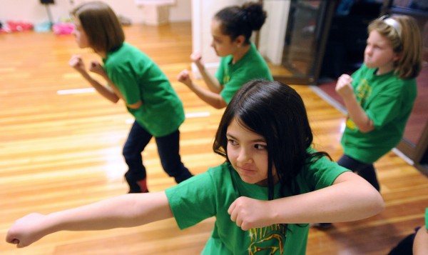 Children during the rehearsal of the Wizard of Oz at the Penobscot Theater in Bangor. The touring company that will put on the show on January 24th at the Collins Center for the Arts recruited 12 children from the area to perform as the munchkins in the show. BDN photo by Gabor Degre Children during the rehearsal of the Wizard of Oz at the Penobscot Theater in Bangor. The touring company that will put on the show on January 24th at the Collins Center for the Arts recruited 12 children from the area to perform as the munchkins in the show. BDN photo by Gabor Degre