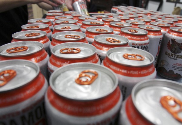 In this Thursday, Jan. 26, 2011 photo, cans of beer are sorted at the Baxter Brewing Co., in Lewiston, Maine. The beer company has joined a growing number of small craft-beer breweries distributing their brews in cans, rather than in bottles. A decade ago, it's believed there weren't any U.S. craft breweries canning their suds. Nowadays, nearly 100 are selling at least one beer variety in metal. In this Thursday, Jan. 26, 2011 photo, cans of beer are sorted at the Baxter Brewing Co., in Lewiston, Maine. The beer company has joined a growing number of small craft-beer breweries distributing their brews in cans, rather than in bottles. A decade ago, it's believed there weren't any U.S. craft breweries canning their suds. Nowadays, nearly 100 are selling at least one beer variety in metal.
