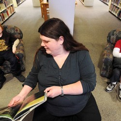 Ginny Gifford with her eight-year-old twin sons Jadon (left) and Jesse Gifford at the Bangor Public Library on Tuesday.