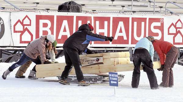 Volunteers move the podium in place as final preparations take place at the 10th Mountain Ski Center in Fort Kent Wednesday. The venue will hoast the Biathlon World Cup event starting Thursday. Volunteers move the podium in place as final preparations take place at the 10th Mountain Ski Center in Fort Kent Wednesday. The venue will hoast the Biathlon World Cup event starting Thursday.