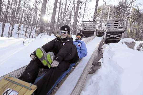 Lydia McGregor of Camden and Nate Shaw-Chapman of Rockport, employees at the Camden Snow Bowl, take a practice run on the toboggan shoot there Friday afternoon, Jan. 28, 2011. The National Toboggan Championships take place there Feb. 11-13, 2011. Lydia McGregor of Camden and Nate Shaw-Chapman of Rockport, employees at the Camden Snow Bowl, take a practice run on the toboggan shoot there Friday afternoon, Jan. 28, 2011. The National Toboggan Championships take place there Feb. 11-13, 2011.