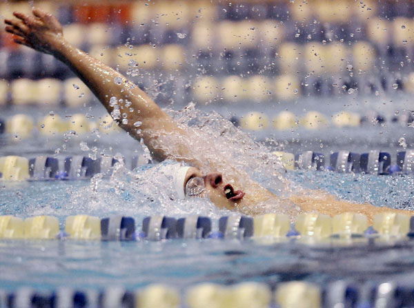 Foxcroft Academy's Cameron Fadley swims the backstroke leg of the 200-yard IM and finished first at Wallace Pool, Monday Feb. 21, 2011. Foxcroft Academy's Cameron Fadley swims the backstroke leg of the 200-yard IM and finished first at Wallace Pool, Monday Feb. 21, 2011.