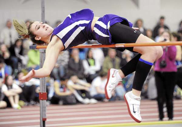 Jen Daley of John Bapst High School competes Monday in the girls high jump during the Class B state track and field championships at Bates College in Lewiston. Daley cleared 5 feet 2 inches to win the event. Jen Daley of John Bapst High School competes Monday in the girls high jump during the Class B state track and field championships at Bates College in Lewiston. Daley cleared 5 feet 2 inches to win the event.