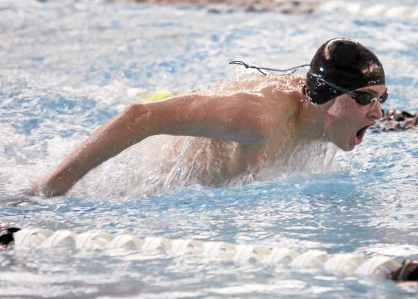 Bangor High School freshman David Smallwood finishes 3rd in the 100-yard butterfly during the Class A state meet Tuesday. Bangor High School freshman David Smallwood finishes 3rd in the 100-yard butterfly during the Class A state meet Tuesday.