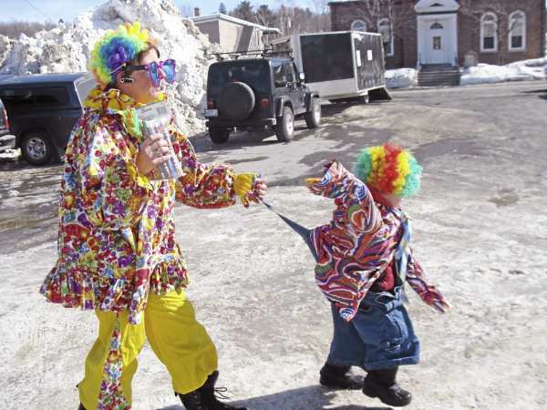 Children of all ages enjoyed the clown school held Thursday at the Family Fun Day in Greenville. The clowns paraded around the Katahdin parking lot. When Danny Mann, 5, of Dover-Foxcroft, popped his suspender button, clown instructor Pat Huckins of Greenville came to his rescue. Children of all ages enjoyed the clown school held Thursday at the Family Fun Day in Greenville. The clowns paraded around the Katahdin parking lot. When Danny Mann, 5, of Dover-Foxcroft, popped his suspender button, clown instructor Pat Huckins of Greenville came to his rescue.
