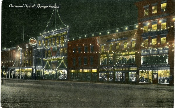 Postmarked 1912, this postcard from the Bangor Public Library shows downtown Bangor lit up in the "carnival spirit," possibly the year before, when this column about the city's Winter Carnival and Food Fair is set. Postmarked 1912, this postcard from the Bangor Public Library shows downtown Bangor lit up in the "carnival spirit," possibly the year before, when this column about the city's Winter Carnival and Food Fair is set.
