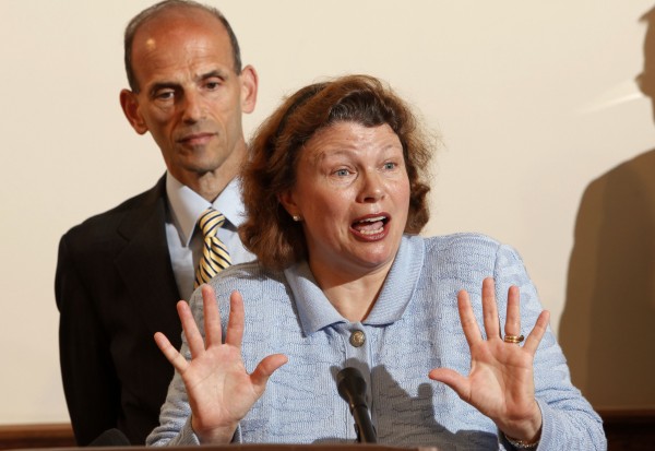 Dr. Dora Anne Mills, seen here with former Gov. John Baldacci, was removed as the head of the MaineCare program on Wednesday. Dr. Dora Anne Mills, seen here with former Gov. John Baldacci, was removed as the head of the MaineCare program on Wednesday.