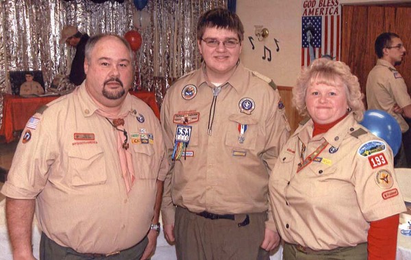 Daniel Haley (center) of Limestone has attained the rank of Eagle Scout, the highest honor among Boy Scouts of America, with the help and guidance of his troop leaders, Scoutmaster Larry Cote (left) and Assistant Scoutmaster Elaine Cote. Daniel Haley (center) of Limestone has attained the rank of Eagle Scout, the highest honor among Boy Scouts of America, with the help and guidance of his troop leaders, Scoutmaster Larry Cote (left) and Assistant Scoutmaster Elaine Cote.