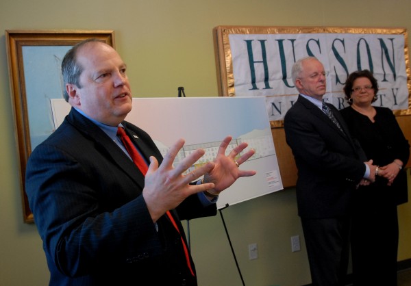 Husson University President Robert Clark announces during a press conference Tuesday that a major new campus construction project will begin in April. The university will construct a five-story multipurpose building that will include classrooms, offices and suite-style living space for 240 students. The $11 million project is scheduled to be completed in August 2012. In the background are (from left) Richard Trott, Husson alumnus and chairman of the board of trustees, and Lynne Coy-Ogan, Husson provost.
Husson University President Robert Clark announces during a press conference Tuesday that a major new campus construction project will begin in April. The university will construct a five-story multipurpose building that will include classrooms, offices and suite-style living space for 240 students. The $11 million project is scheduled to be completed in August 2012. In the background are (from left) Richard Trott, Husson alumnus and chairman of the board of trustees, and Lynne Coy-Ogan, Husson provost.