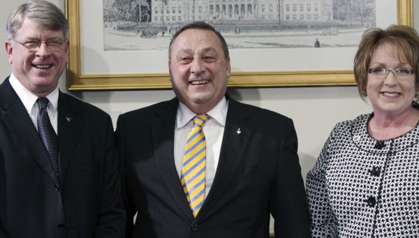 Gov. Paul LePage, center, stands with Cheryl Russell, right, of Chester, and Chandler Woodcock, left, of Farmington, at a news conference in Augusta.LePage announced that Russell has been chosen to become the next Labor Commissioner and Woodcock has been chosen to become the next Inland Fisheries and Wildlife Commissioner. Gov. Paul LePage, center, stands with Cheryl Russell, right, of Chester, and Chandler Woodcock, left, of Farmington, at a news conference in Augusta.LePage announced that Russell has been chosen to become the next Labor Commissioner and Woodcock has been chosen to become the next Inland Fisheries and Wildlife Commissioner.