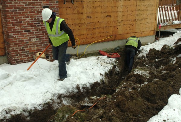 Workers from Bangor Natural Gas work on installing a residential line on Clover Lane in Brewer on Tuesday, February 16. The company is expanding its service to neighborhoods throughout the Bangor area. Workers from Bangor Natural Gas work on installing a residential line on Clover Lane in Brewer on Tuesday, February 16. The company is expanding its service to neighborhoods throughout the Bangor area.
