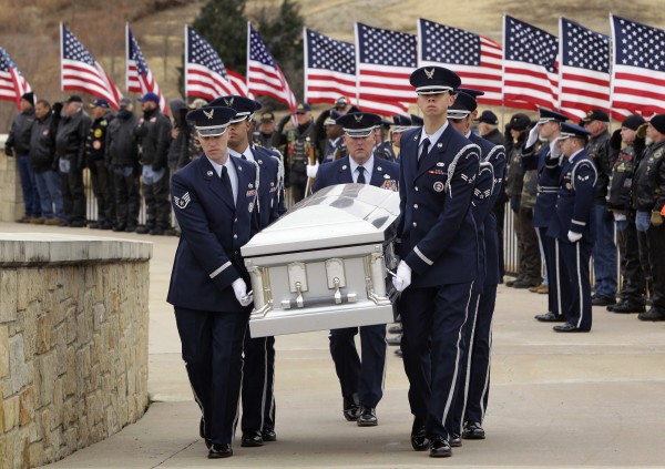Dyess Air Force Base color guard carry the remains of Col. James E. Dennany of Kalamazoo, Mich., and Maj. Robert L. Tucci of Detroit following a burial ceremony at Dallas-Fort Worth National Cemetery, Friday, Jan. 14, 2011, in Dallas. The military funeral honored the two U.S. airmen from the Vietnam War who had been missing in action for more than four decades. Dyess Air Force Base color guard carry the remains of Col. James E. Dennany of Kalamazoo, Mich., and Maj. Robert L. Tucci of Detroit following a burial ceremony at Dallas-Fort Worth National Cemetery, Friday, Jan. 14, 2011, in Dallas. The military funeral honored the two U.S. airmen from the Vietnam War who had been missing in action for more than four decades.