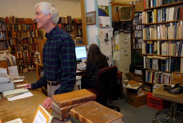 Bill Lippincott, owner of Lippincott Books, is seen in his Bangor store on Monday, Feb. 14, 2011. Although Lippincott will close the Central Street storefront, he will continue to sell books online. Bill Lippincott, owner of Lippincott Books, is seen in his Bangor store on Monday, Feb. 14, 2011. Although Lippincott will close the Central Street storefront, he will continue to sell books online.