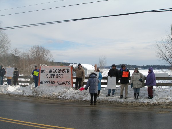 Local demonstrators show support for union members in Wisconsin Saturday during an hourlong gathering at the Mill Stream bridge in Blue Hill. Local demonstrators show support for union members in Wisconsin Saturday during an hourlong gathering at the Mill Stream bridge in Blue Hill.
