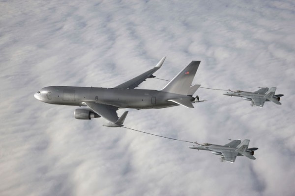 The New Generation (NewGen) Boeing KC-46A Tanker demonstrates its ability to simultaneously refuel two F/A-18 Super Hornet aircraft from the wing air refueling pods. Photo courtesy of The Boeing Company. The New Generation (NewGen) Boeing KC-46A Tanker demonstrates its ability to simultaneously refuel two F/A-18 Super Hornet aircraft from the wing air refueling pods. Photo courtesy of The Boeing Company.
