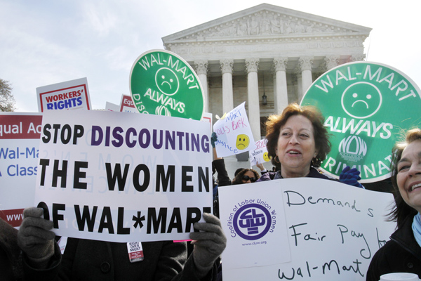 Carol Rosenblatt of Washington (right), and others, take part in rally outside the Supreme Court in Washington, Tuesday in support of the plaintiffs in a case of women employees against Wal-Mart Carol Rosenblatt of Washington (right), and others, take part in rally outside the Supreme Court in Washington, Tuesday in support of the plaintiffs in a case of women employees against Wal-Mart