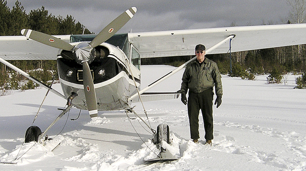Daryl Gordon stands next to a plane (not the one in which he crashed) on a frozen lake in 2007. Gordon, one of the agency's game wardens, was killed in the crash of a small plane on Clear Lake in a remote northern part of Piscataquis County Thursday night. Daryl Gordon stands next to a plane (not the one in which he crashed) on a frozen lake in 2007. Gordon, one of the agency's game wardens, was killed in the crash of a small plane on Clear Lake in a remote northern part of Piscataquis County Thursday night.