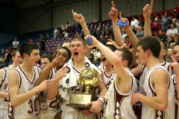 Bangor High School's Josiah Hartley, holding the gold ball, and teammates celebrate their boys Class A state title after defeating Cheverus High School 58-49 at the Augusta Civic Center on Saturday night. Bangor High School's Josiah Hartley, holding the gold ball, and teammates celebrate their boys Class A state title after defeating Cheverus High School 58-49 at the Augusta Civic Center on Saturday night.
