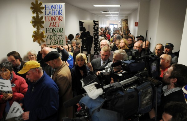 The hallway leading to the Maine Department of Labor in Augusta was jammed with people on Friday including artists and union members who showed up to support the continued display of a mural depicting Maine's working class heritage and to commemorate the 100th anniversary of the Triangle Shirtwaist Factory Fire, the impetus for Frances Perkins' work on behalf of all working people. The hallway leading to the Maine Department of Labor in Augusta was jammed with people on Friday including artists and union members who showed up to support the continued display of a mural depicting Maine's working class heritage and to commemorate the 100th anniversary of the Triangle Shirtwaist Factory Fire, the impetus for Frances Perkins' work on behalf of all working people.