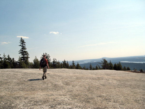 An unidentified hiker cross Great Pond Mountain, just one of several hiking trails provided by Great Pond Mountain Conservation Trust in Orland. Many of the over 100 land trusts in Maine contain hiking trails. An unidentified hiker cross Great Pond Mountain, just one of several hiking trails provided by Great Pond Mountain Conservation Trust in Orland. Many of the over 100 land trusts in Maine contain hiking trails.