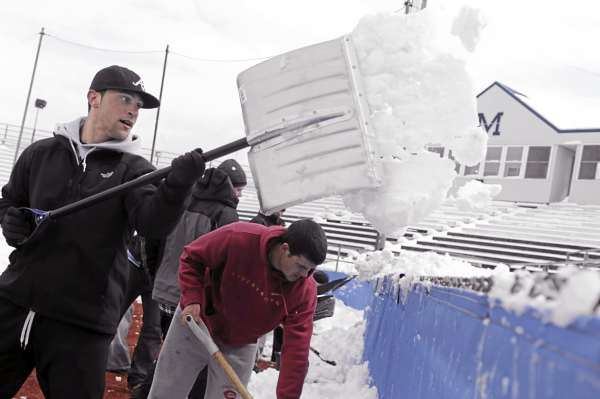 University of Maine outfield Kyle Silva (left) helps Black Bear teammates shovel snow from Mahaney Diamond on April 2. The baseball team's home games against Bryant University last weekend were canceled due to the recent snowfall. That means the Black Bears will have had nearly two weeks off when they take on Stony Brook starting Saturday. University of Maine outfield Kyle Silva (left) helps Black Bear teammates shovel snow from Mahaney Diamond on April 2. The baseball team's home games against Bryant University last weekend were canceled due to the recent snowfall. That means the Black Bears will have had nearly two weeks off when they take on Stony Brook starting Saturday.
