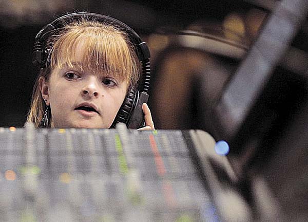 Molly Derrig looks up from her cue script to check with sound engineers as she runs through a rehearsal of the technical side of the rock musical 'Tommy' at the Gracie Theater Thursday March 31, 2011. Molly Derrig looks up from her cue script to check with sound engineers as she runs through a rehearsal of the technical side of the rock musical 'Tommy' at the Gracie Theater Thursday March 31, 2011.