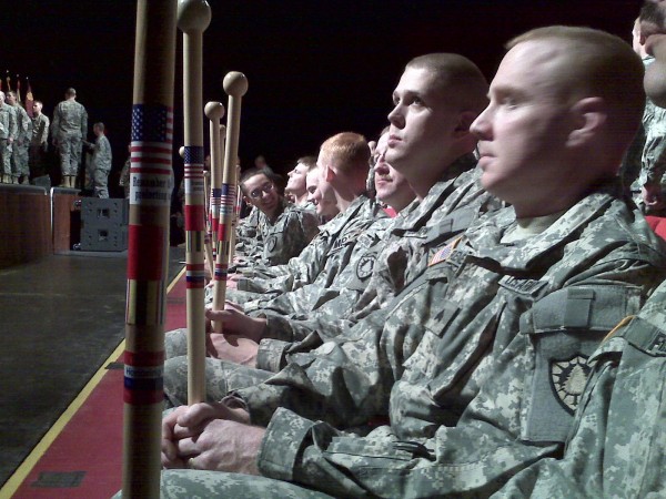 1136th soldiers look at the walking sticks just given to them by World War II veteran Galen Cole at the unit's Freedom Salute on Friday at the University of Maine's Collins Center for the Arts. 1136th soldiers look at the walking sticks just given to them by World War II veteran Galen Cole at the unit's Freedom Salute on Friday at the University of Maine's Collins Center for the Arts.